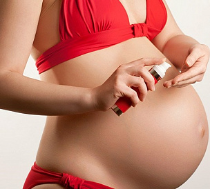 9 أفضل سبل الانتصاف لعلامات التمدد أثناء الحمل
